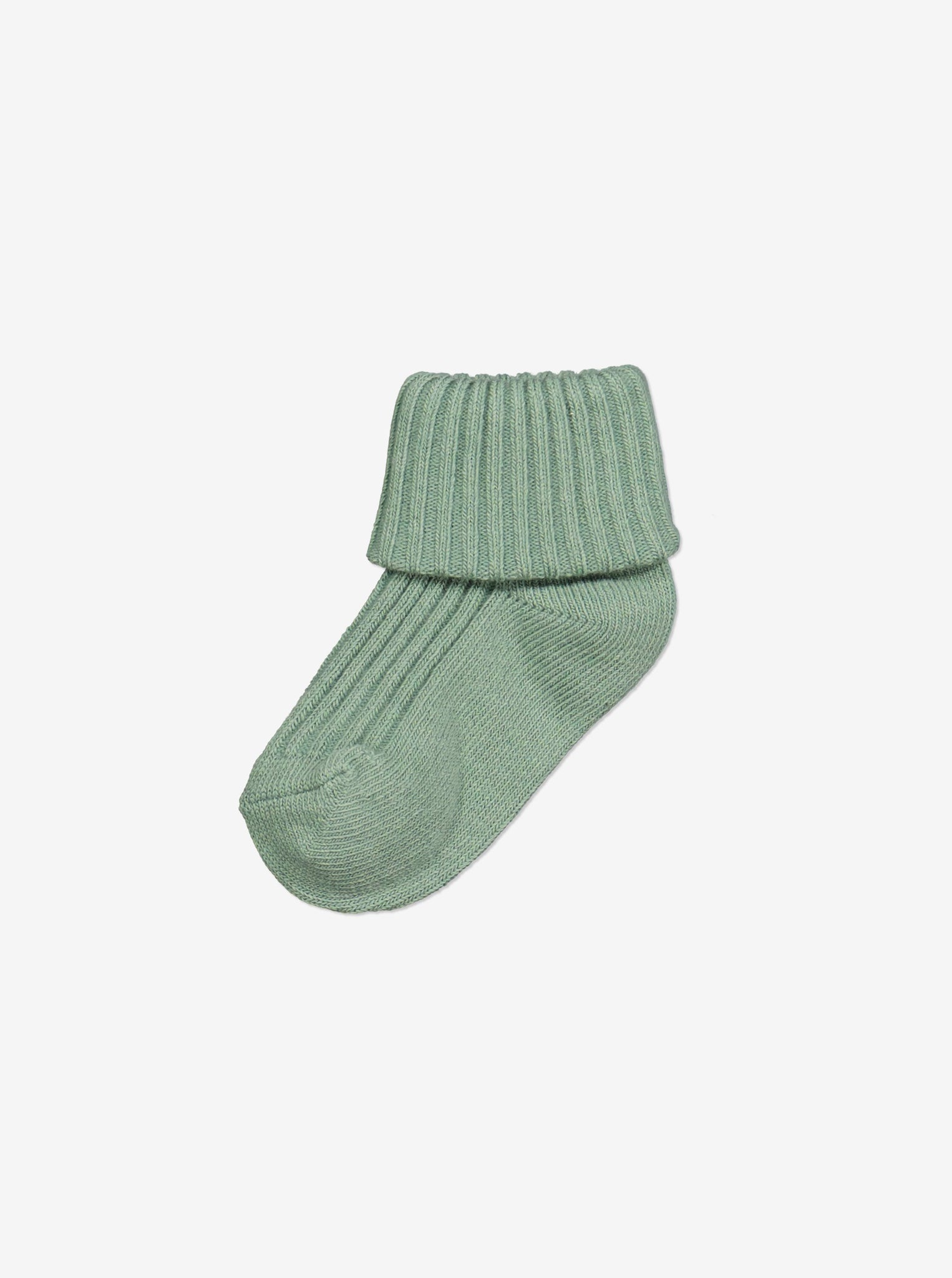  Organic Cotton Green Baby Socks from Polarn O. Pyret Kidswear. Made from environmentally friendly materials.