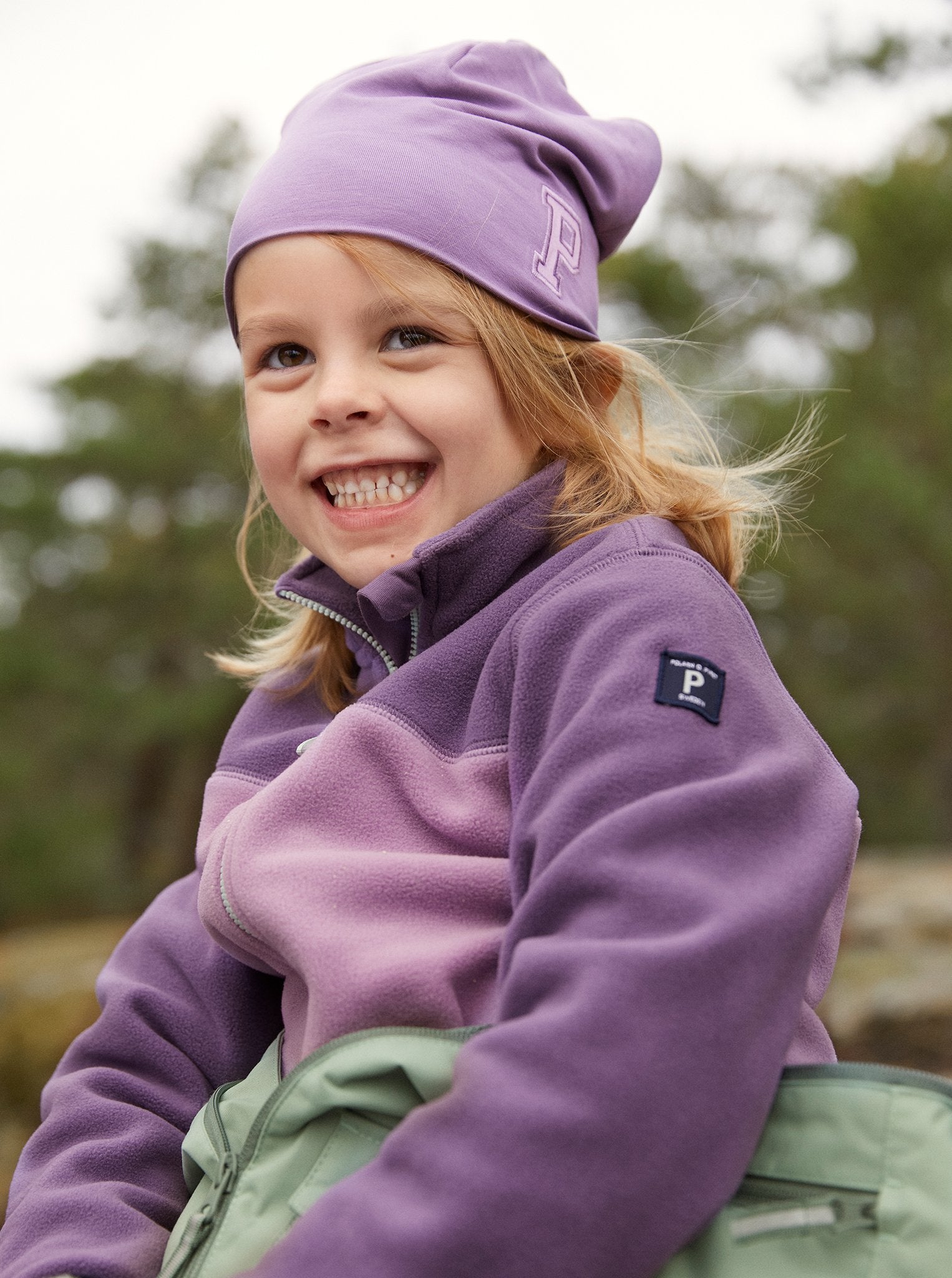Purple Kids Beanie Hat from Polarn O. Pyret Kidswear. Warm kids beanie