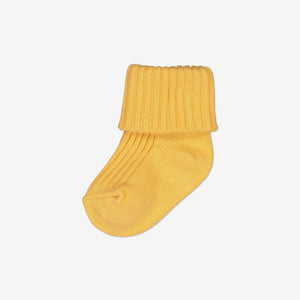  Organic Cotton Yellow Baby Socks from Polarn O. Pyret Kidswear. Made using environmentally friendly materials.