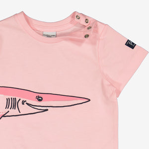 Shark Print Pink Kids T-Shirt from Polarn O. Pyret Kidswear. Made from 100% GOTS Organic Cotton.
