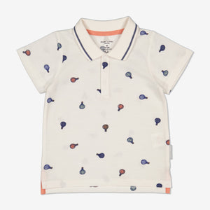 Balloon Print White Baby Polo Shirt from Polarn O. Pyret Kidswear. Made from 100% GOTS Organic Cotton.