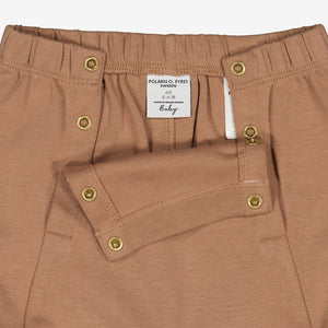 Organic Cotton Beige Baby Shorts from Polarn O. Pyret Kidswear. Made from 100% GOTS Organic Cotton.