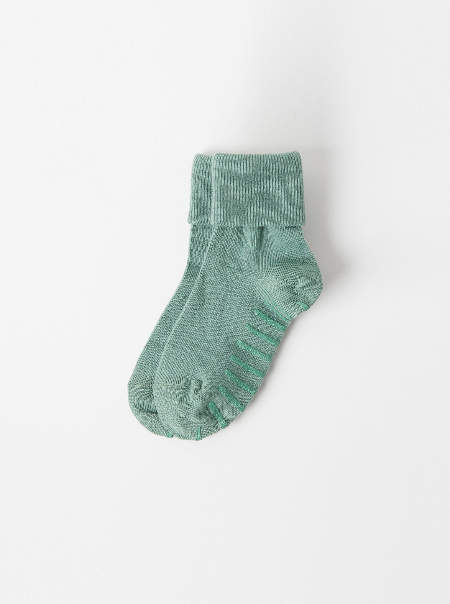 Green Merino Wool Baby Socks from the Polarn O. Pyret kidswear collection. The best ethical kids outerwear.