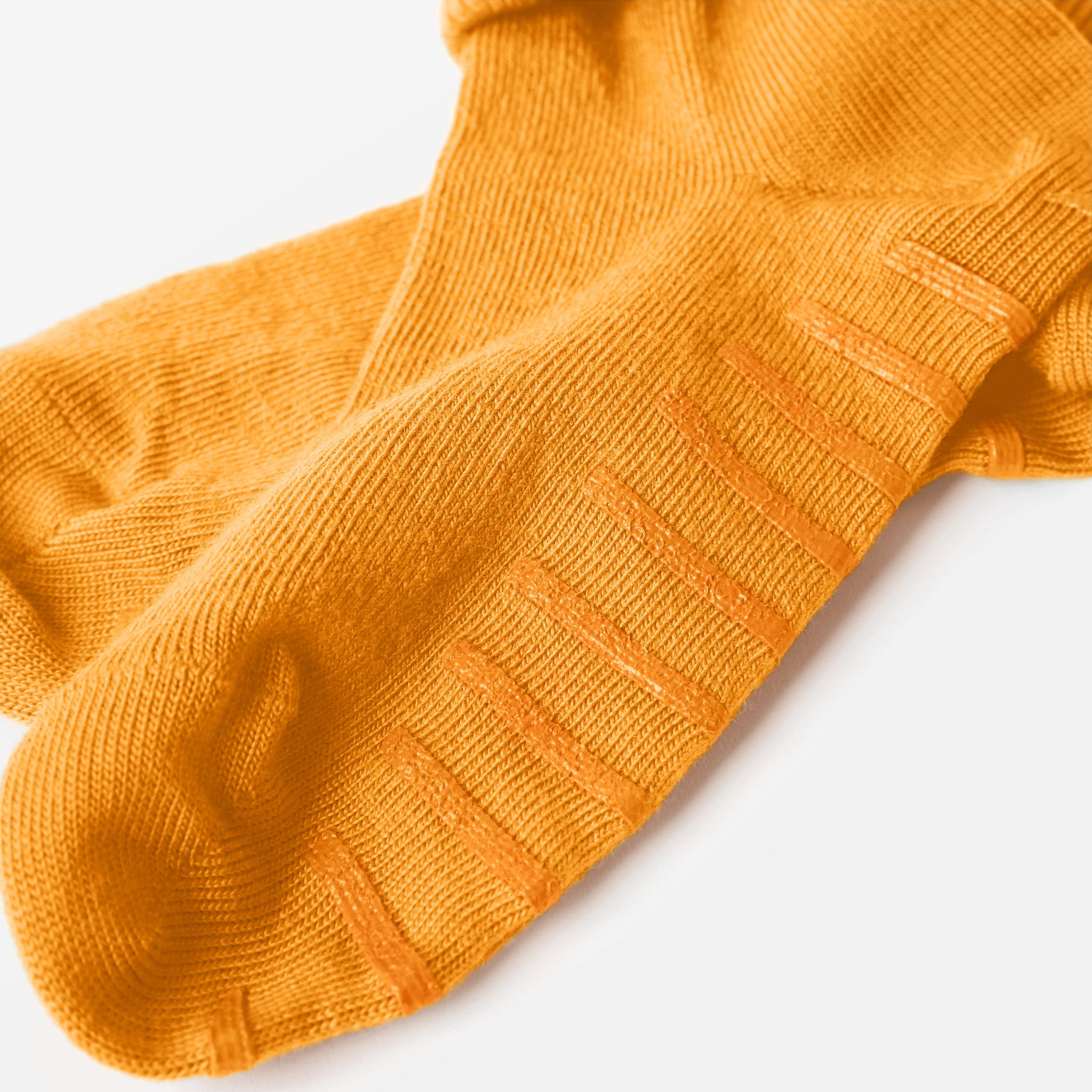 Yellow Merino Wool Baby Socks from the Polarn O. Pyret kidswear collection. Ethically produced kids outerwear.