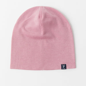 Merino Wool Pink Kids Beanie Hat from the Polarn O. Pyret kidswear collection. Made using ethically sourced materials.