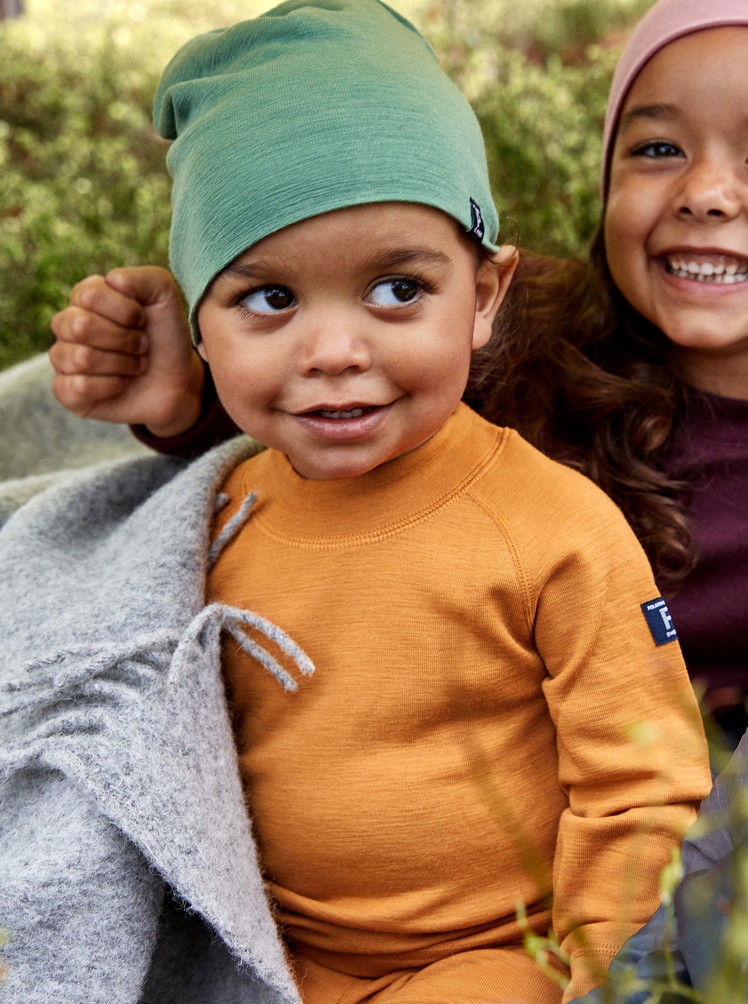 Merino Wool Green Kids Beanie Hat from the Polarn O. Pyret kidswear collection. Ethically produced outerwear.