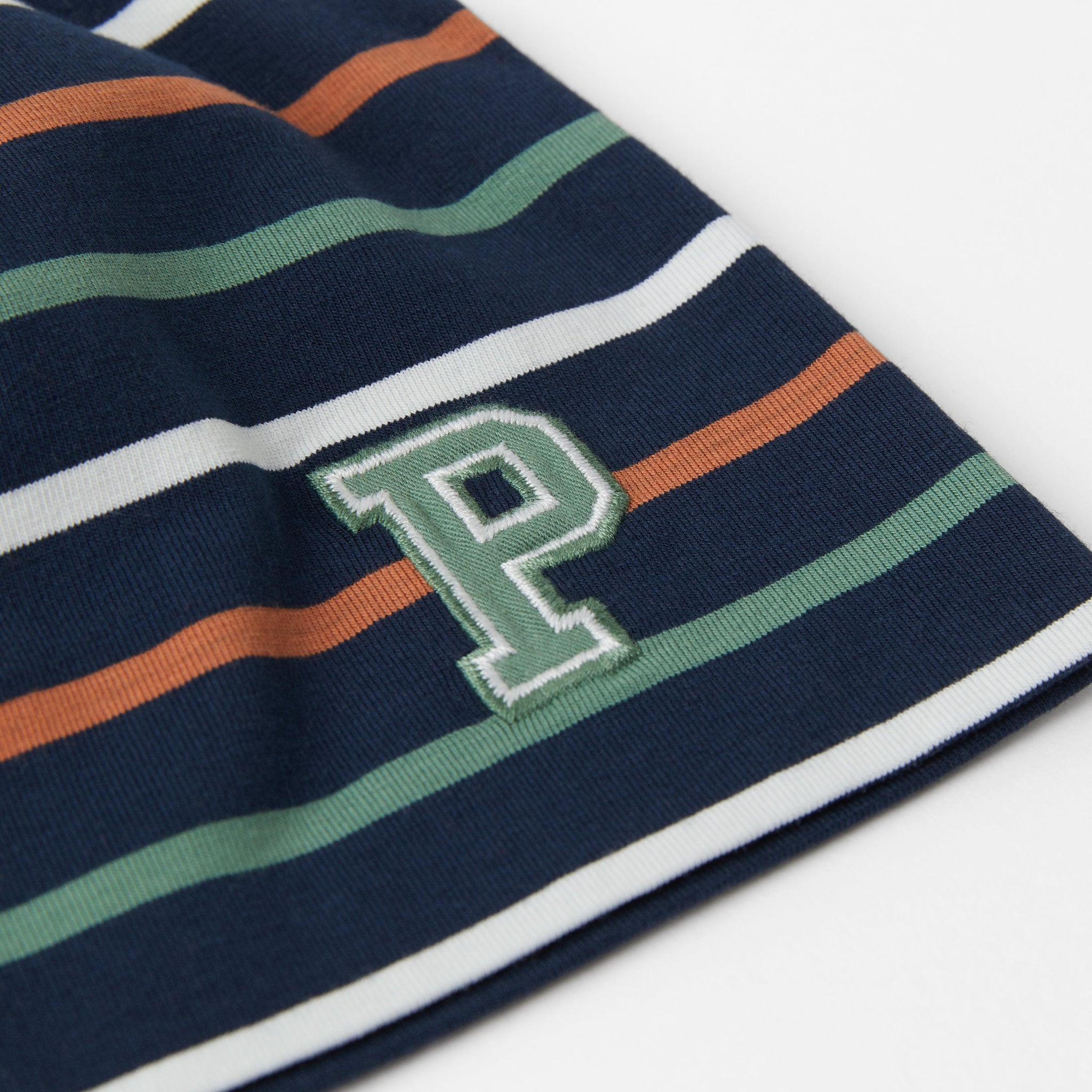Striped Navy Kids Beanie Hat from the Polarn O. Pyret kidswear collection. Ethically produced kids outerwear.