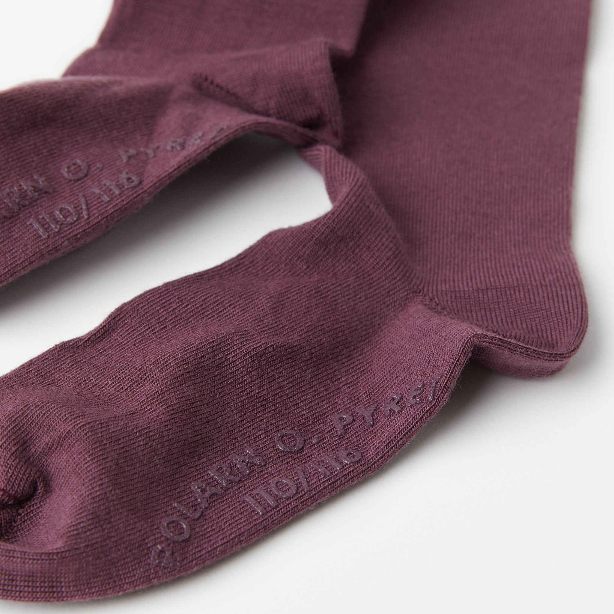 Merino Burgundy Antislip Kids Tights from the Polarn O. Pyret kidswear collection. Sustainably produced kids outerwear.