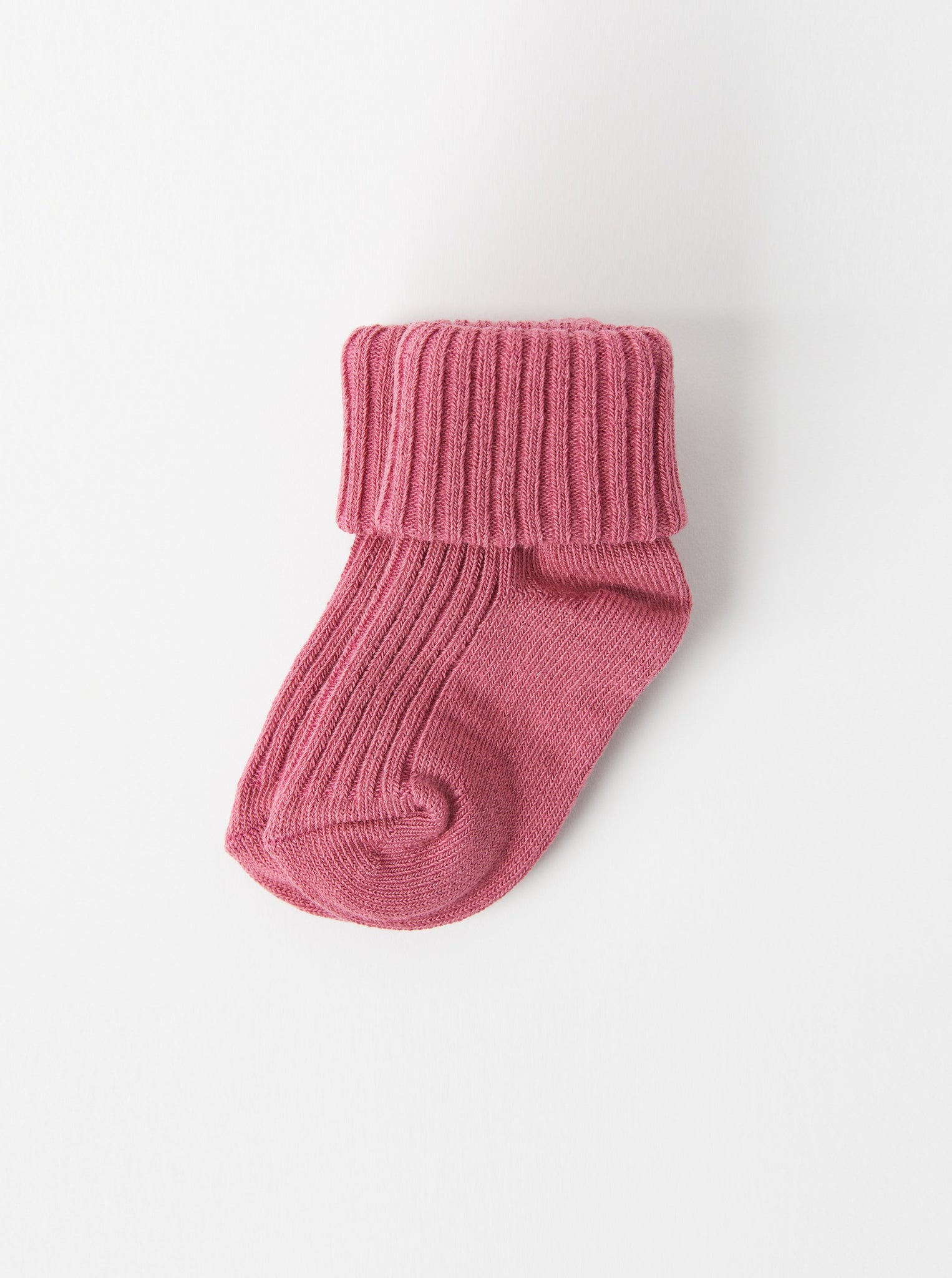 Organic Cotton Pink Baby Socks from the Polarn O. Pyret Kidswear collection. Ethically produced kids clothing.