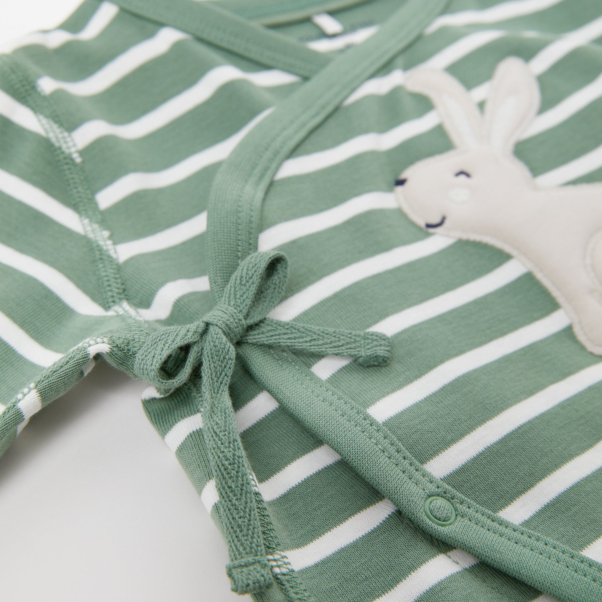 Rabbit Print Green Baby Romper from the Polarn O. Pyret Kidswear collection. The best ethical kids clothes