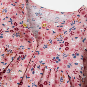 Organic Cotton Floral Baby Dress from the Polarn O. Pyret Kidswear collection. Nordic kids clothes made from sustainable sources.