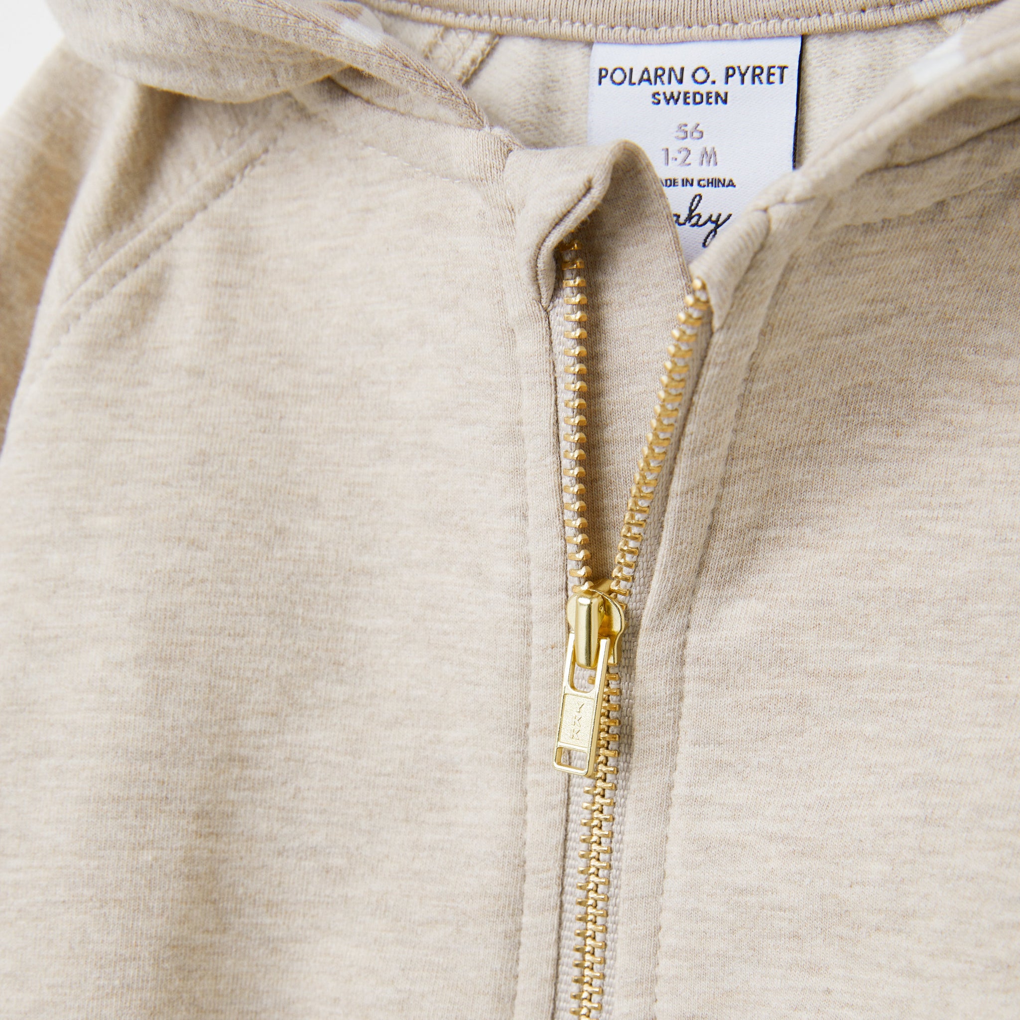 Organic Cotton Beige Baby Hoodie from the Polarn O. Pyret Kidswear collection. Nordic kids clothes made from sustainable sources.