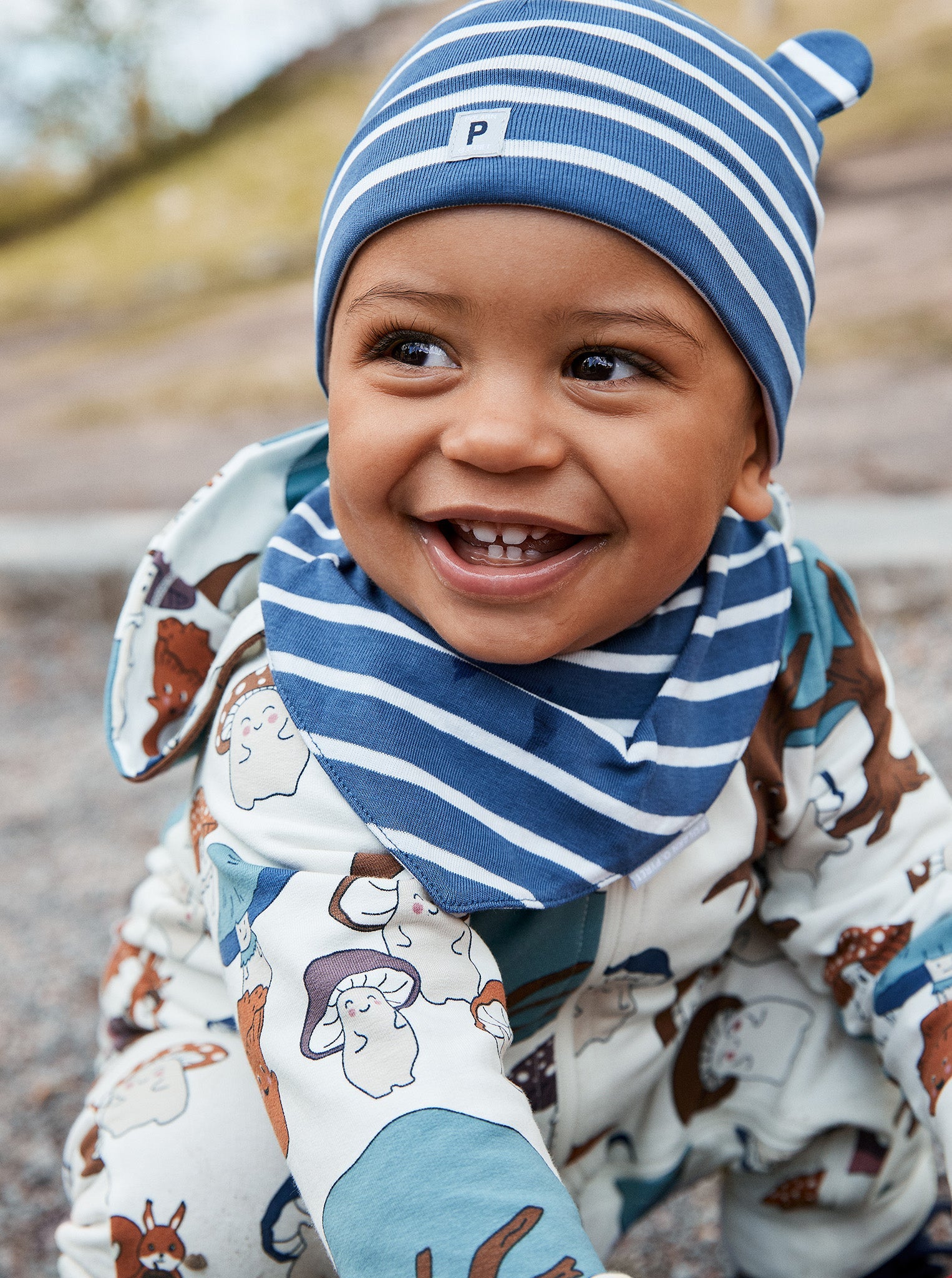 Organic Cotton Blue Baby Bib from the Polarn O. Pyret Kidswear collection. Ethically produced kids clothing.
