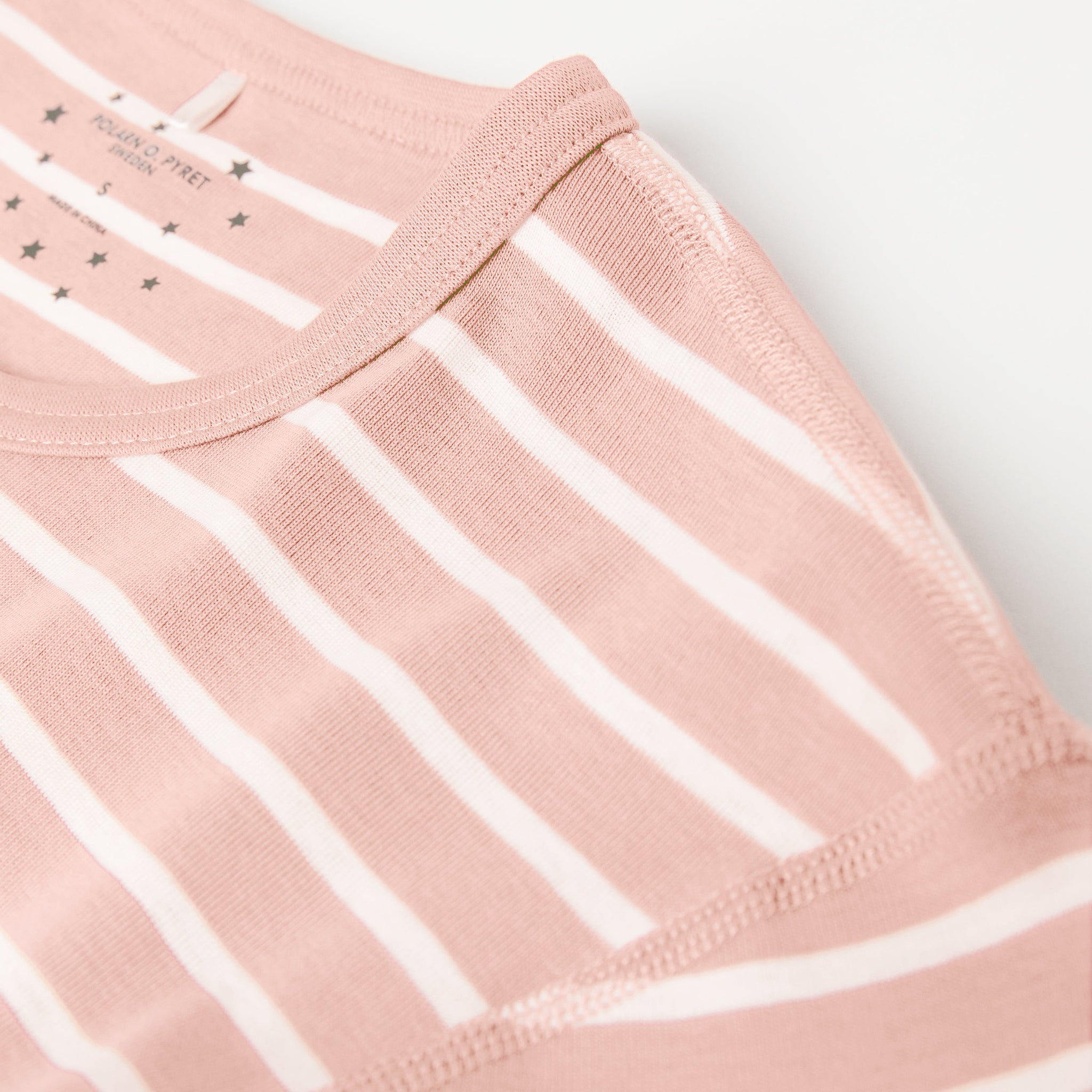 Striped Pink Adult Pyjamas from the Polarn O. Pyret adult collection. Ethically produced adult pyjamas