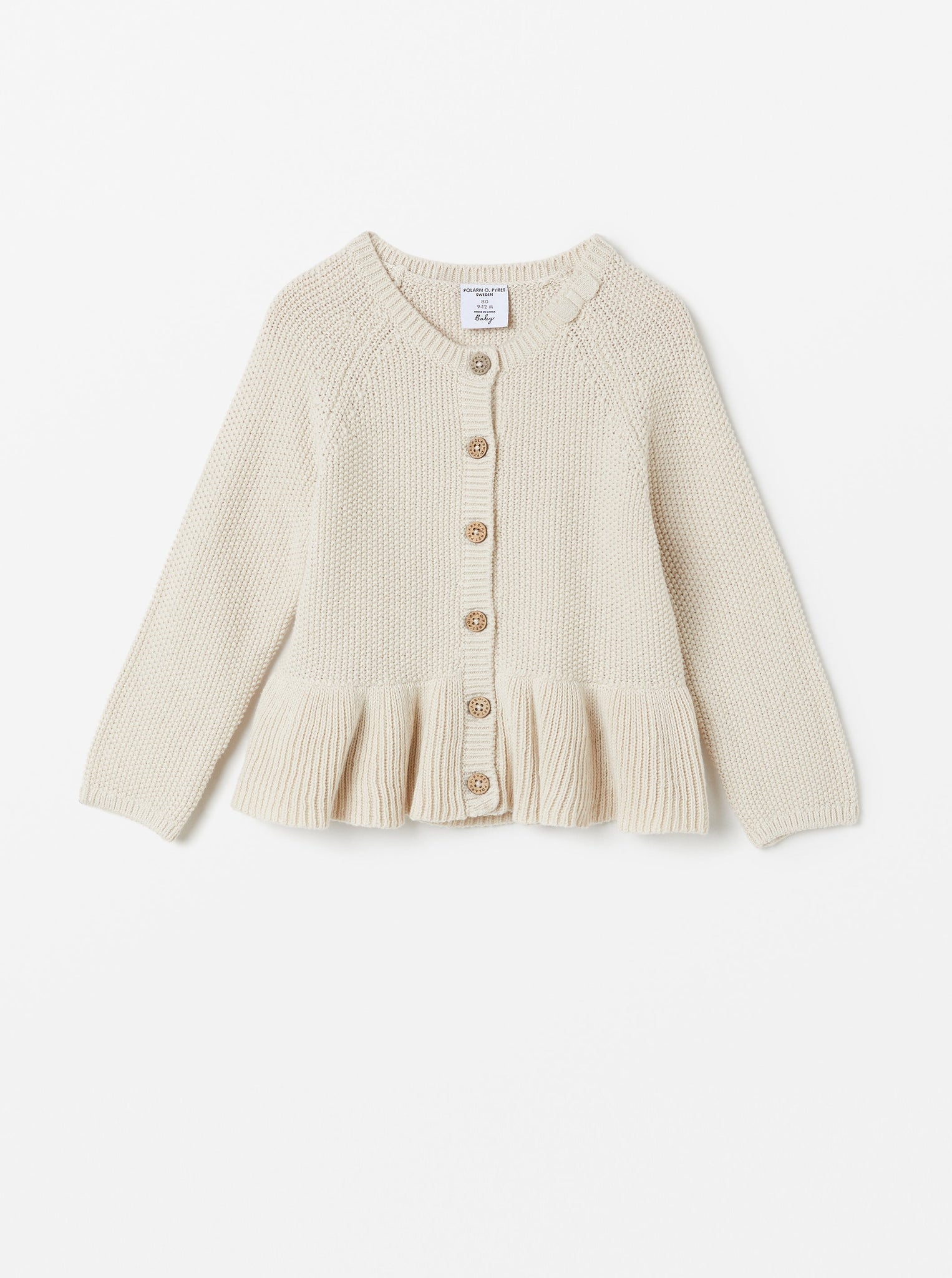 Ruffled White Knitted Baby Cardigan from the Polarn O. Pyret babywear collection. Ethically produced baby clothing.