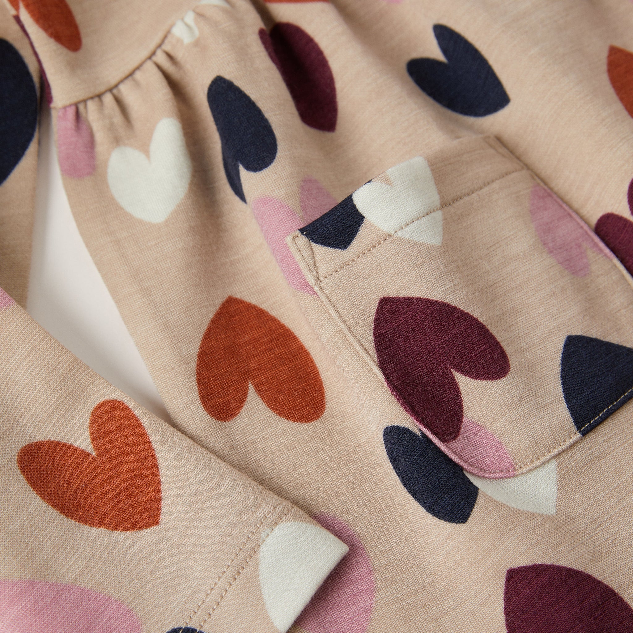 Heart Print Girls Dress from the Polarn O. Pyret kidswear collection. Clothes made using sustainably sourced materials.