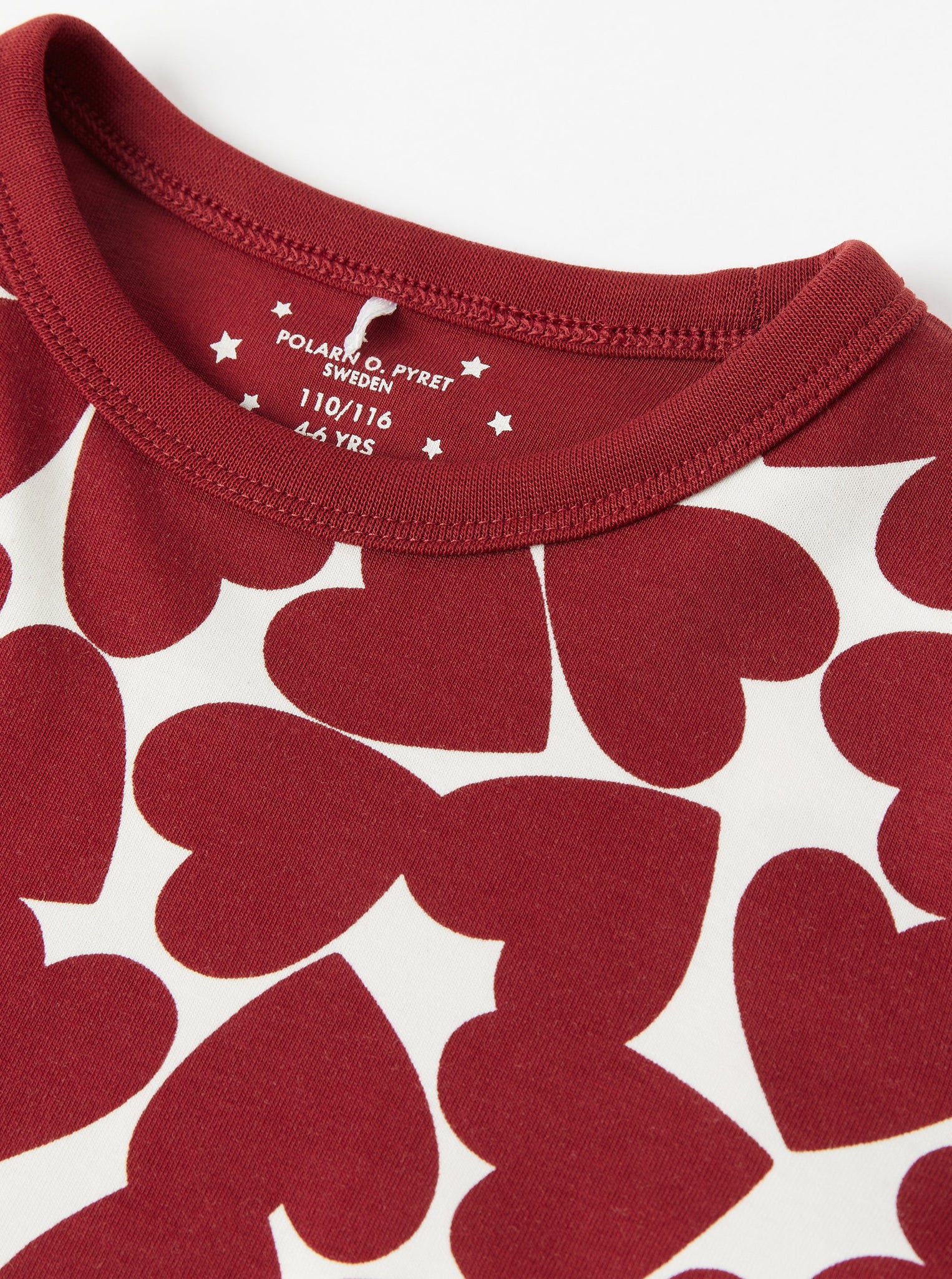 Cotton Red Heart Print Kids Pyjamas from the Polarn O. Pyret kidswear collection. Ethically produced kids clothing.