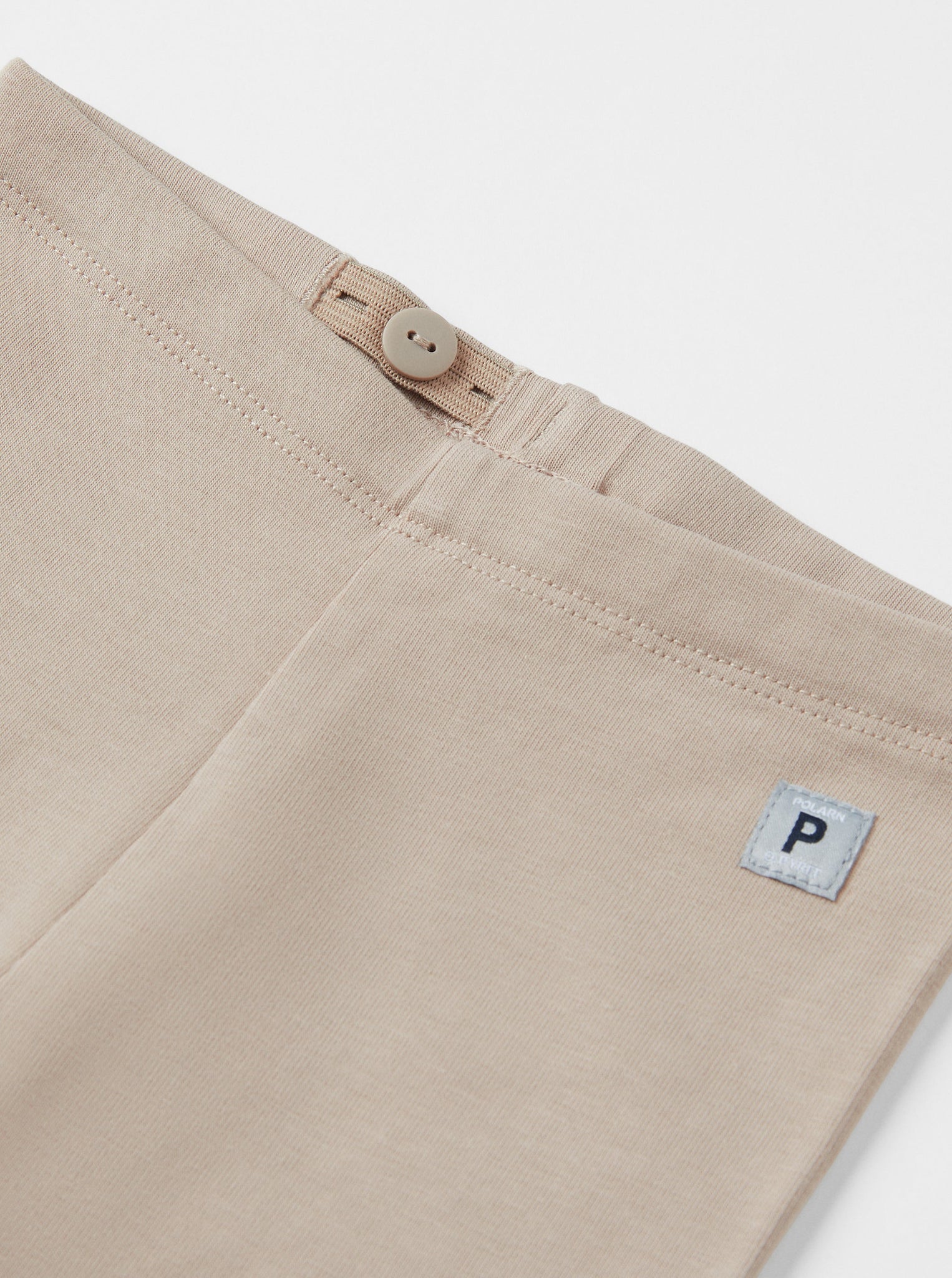 Organic Cotton Beige Baby Leggings from the Polarn O. Pyret babywear collection. Clothes made using sustainably sourced materials.