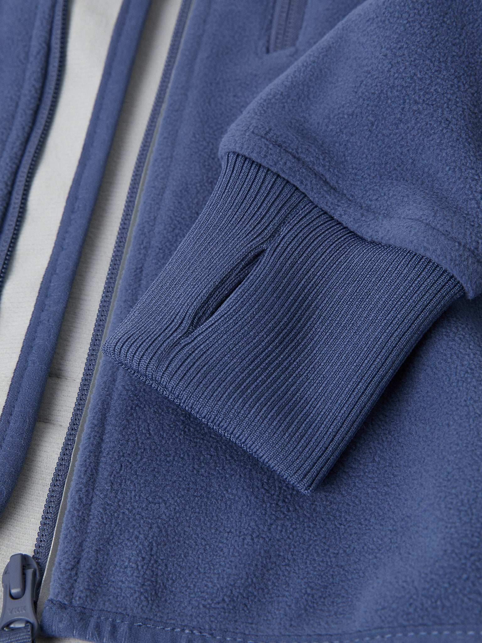 Blue Waterproof Kids Fleece Jacket from the Polarn O. Pyret outerwear collection. Made using ethically sourced materials.