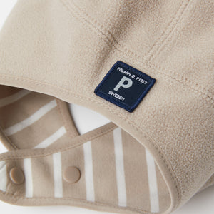Beige Windproof Fleece Baby Hat from the Polarn O. Pyret outerwear collection. Kids outerwear made from sustainably source materials