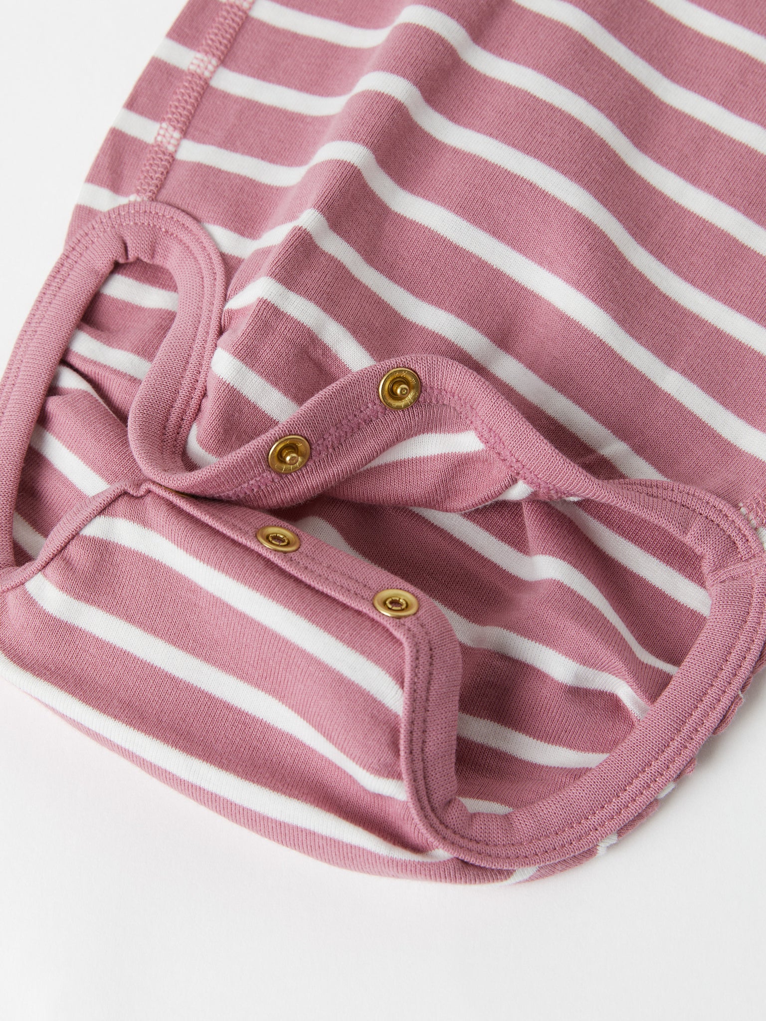 Organic Cotton Pink Babygrow from the Polarn O. Pyret baby collection. Made using 100% GOTS Organic Cotton