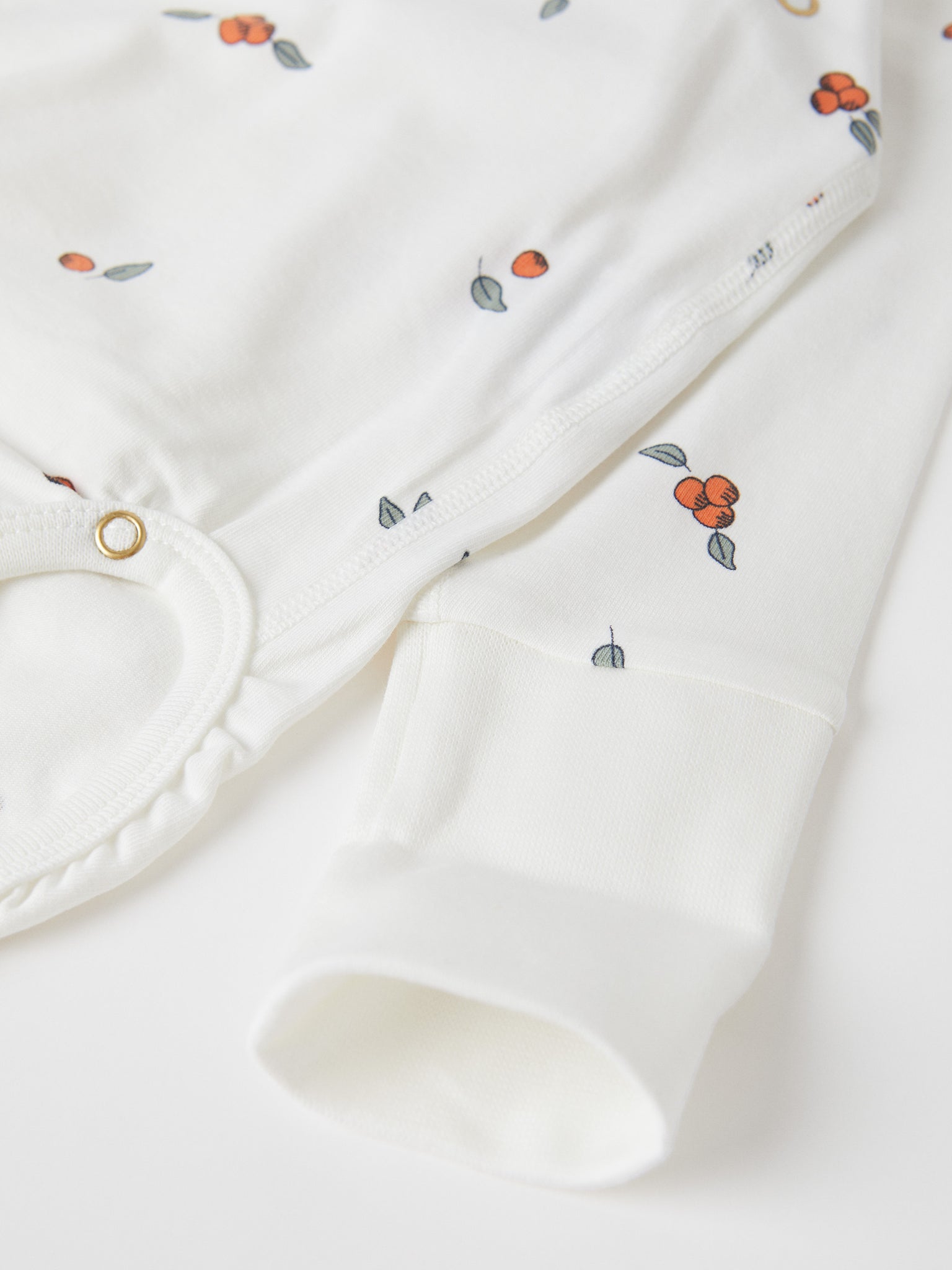 Organic Cotton White Wraparound Babygrow from the Polarn O. Pyret baby collection. Clothes made using sustainably sourced materials.