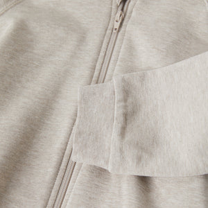 Organic Cotton Beige Baby Hoodie from the Polarn O. Pyret baby collection. Nordic baby clothes made from sustainable sources.
