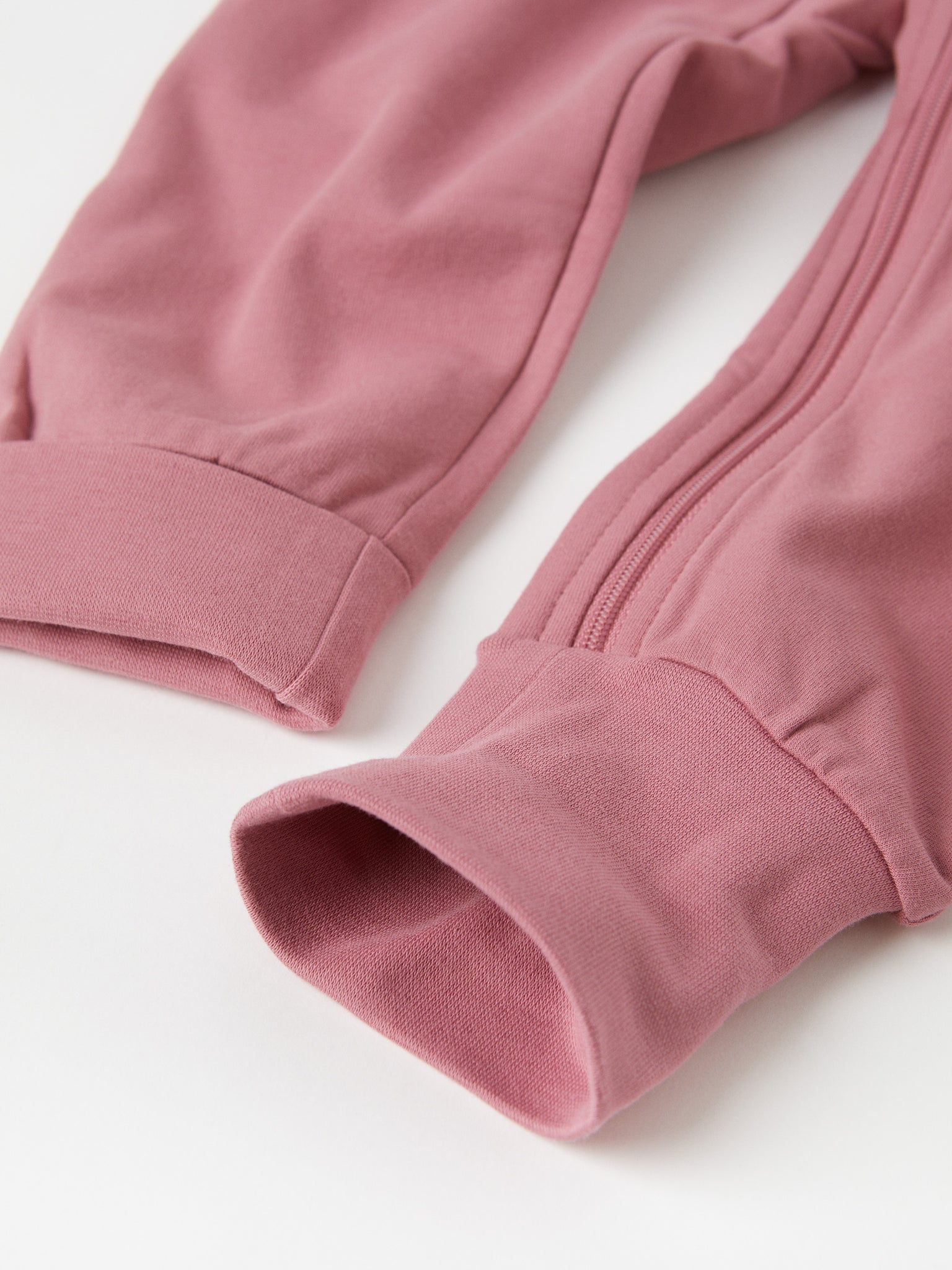 Pink Organic Cotton Baby All-In-One from the Polarn O. Pyret baby collection. The best ethical baby clothes