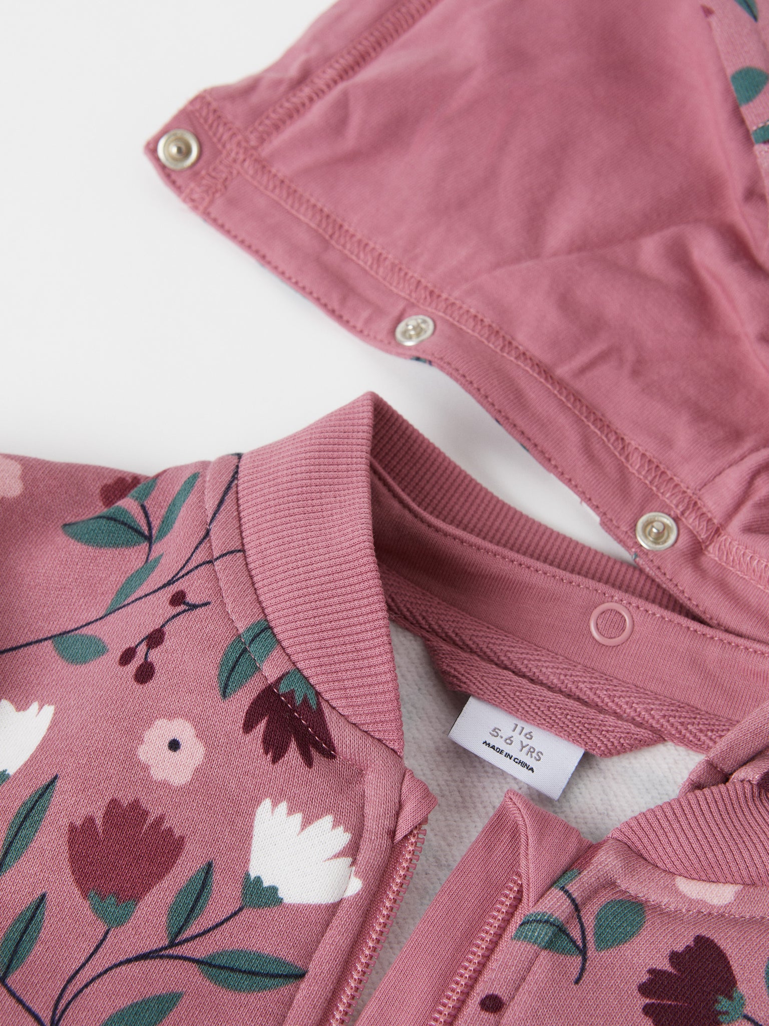 Organic Cotton Floral Kids Hoodie from the Polarn O. Pyret kidswear collection. Clothes made using sustainably sourced materials.
