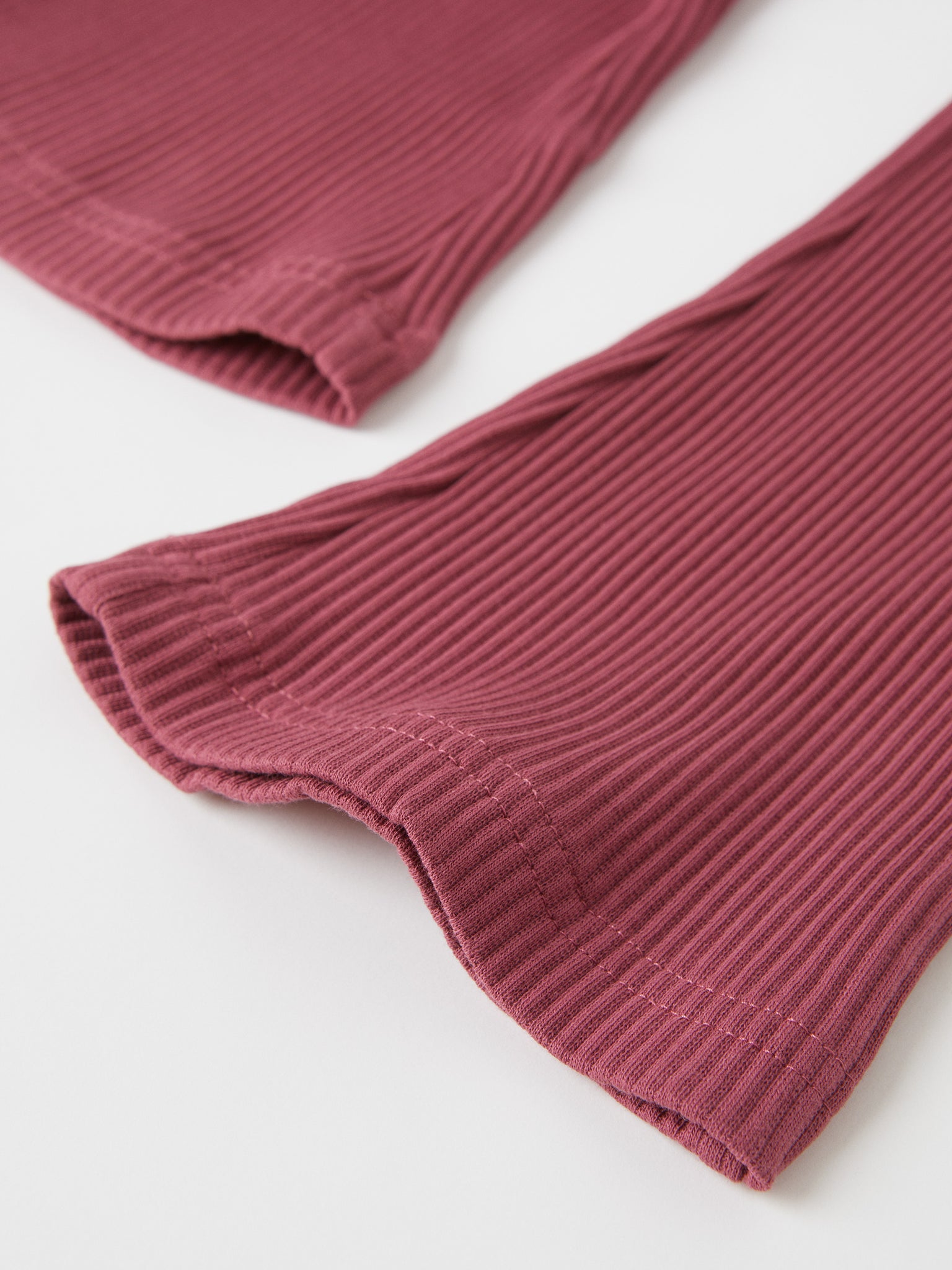 Organic Cotton Red Ribbed Kids Leggings from the Polarn O. Pyret kidswear collection. The best ethical kids clothes