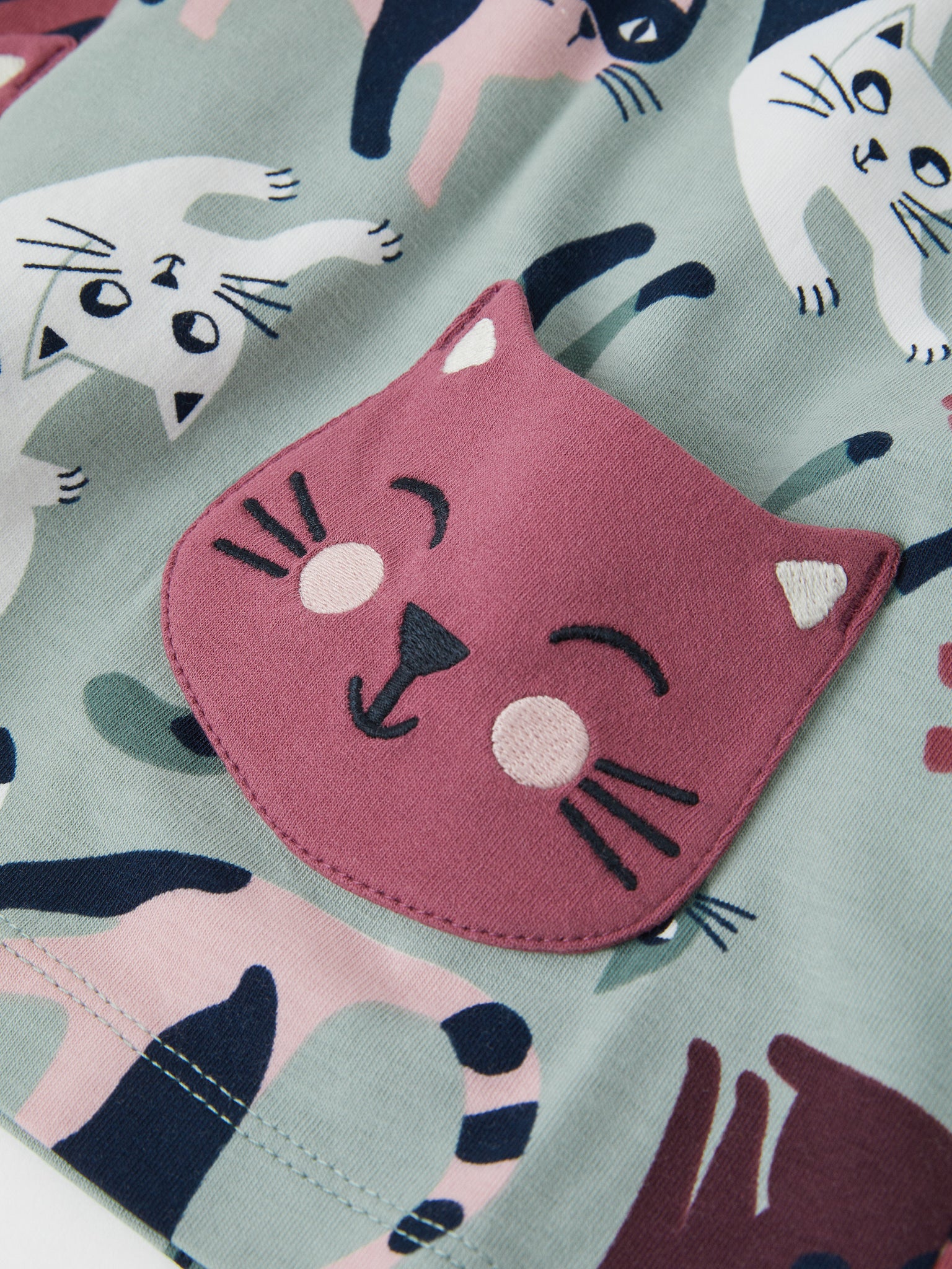 Green Organic Cotton Kids Cat Top from the Polarn O. Pyret kidswear collection. Ethically produced kids clothing.