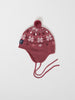Merino Wool Red Kids Bobble Hat from the Polarn O. Pyret outerwear collection. Quality kids clothing made to last.