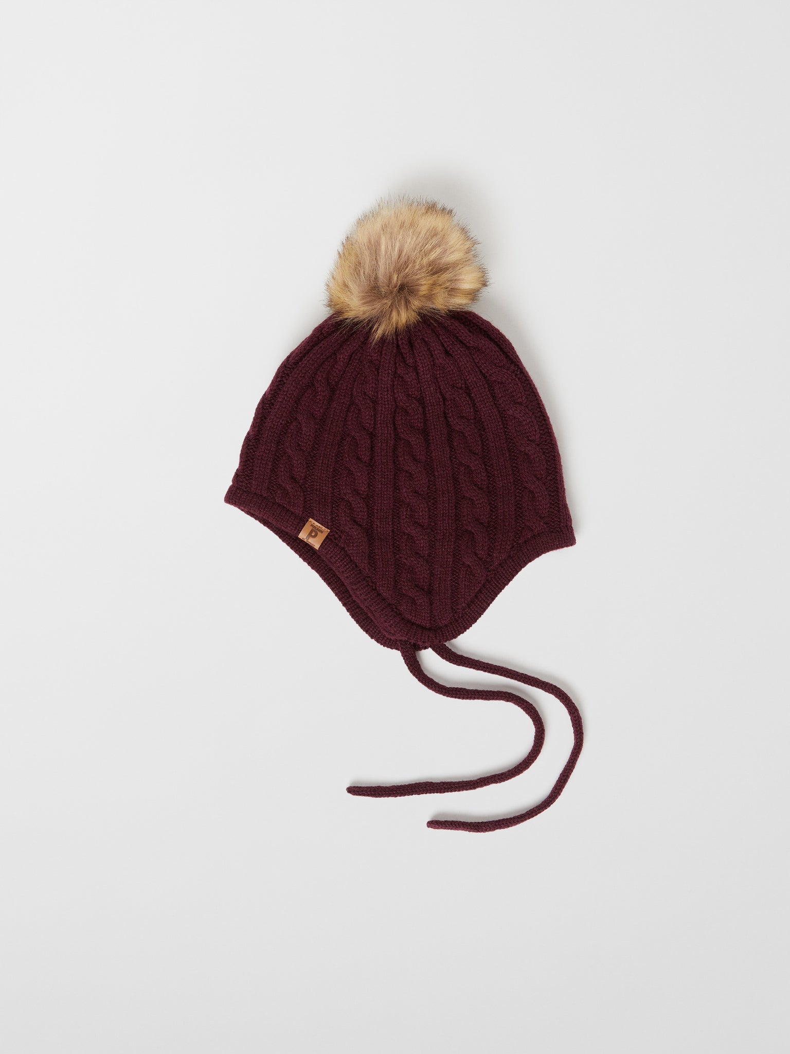 Burgundy Kids Wool Bobble Hat from the Polarn O. Pyret outerwear collection. Quality kids clothing made to last.