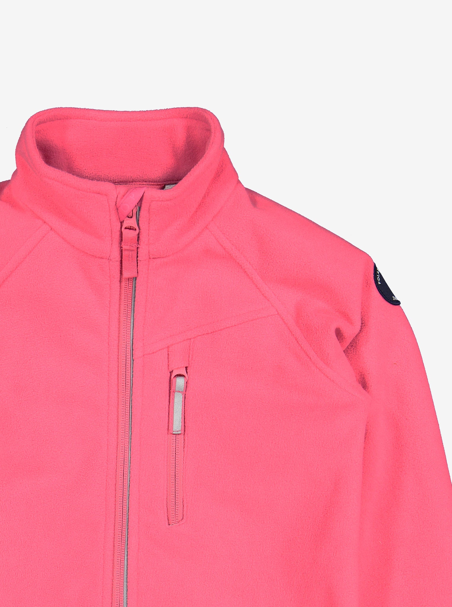 Close up shot of pink, kids waterproof fleece jacket made of breathable fabric, with reflector zip and front pocket.