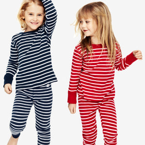 red and white stripes kids leggings, ethical organic cotton, long lasting polarn o. pyret quality, kids wearing PO.P classic top and leggings in stripe design 
