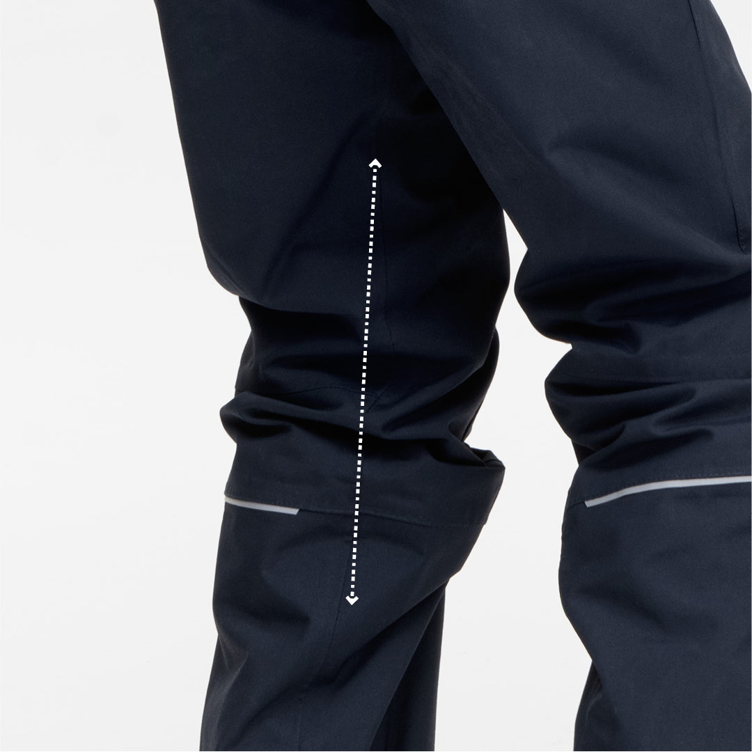 Kids extendable Navy Waterproof Shell Trousers, warm ethical high quality showing extendable feature 